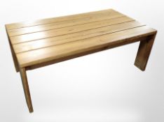 A pine plank top rectangular coffee table, 130cm long x 73cm wide x 51cm high.
