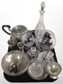 A hammered pewter teapot and other pewter items,