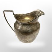 A 19th-century silver cream jug. CONDITION REPORT: 94.9g.