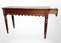 A reproduction mahogany hall table fitted a drawer, 120cm wide x 44cm deep x 76cm high.
