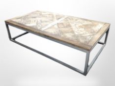 A contemporary metal-framed pine-topped low coffee table, 160cm long x 90cm wide x 41cm high.