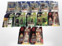 12 Hasbro Star Wars figurines including the Phantom Menace, The Empire Strikes Back, etc.