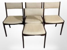A set of four contemporary Danish teak-farmed dining chairs.
