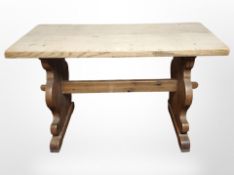 An oak refectory coffee table, width 92cm.