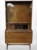 A 20th-century Danish teak and ply bookcase fitted drawers beneath,