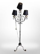 A wrought-iron standard lamp.