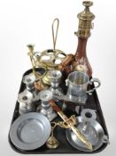 A group of metal wares including pewter ejector candlestick, further pewter and brass candlesticks,