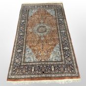 An Isfahan rug, Central Iran, 256cm x 155cm.