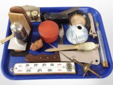 A group of letter knives, cigar cutter, thermometers, butcher's cleaver, teak-mounted bookends, etc.