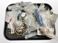 A group of vintage beaded necklaces and wooden beads, etc.