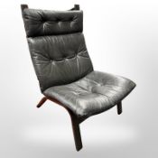 A 20th-century Danish black leather bentwood relaxer chair, width 60cm x height 96cm.