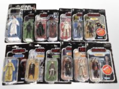 13 Kenner Star Wars figurines including The Mandalorian, The Force Awakens, etc., boxed.
