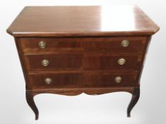 A reproduction continental mahogany three-drawer chest, width 80cm.