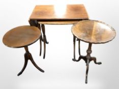 A reproduction nest of two tables and two further tripod tables.