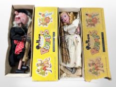 Two Pelham puppets, Red Riding Hood and The Wicked Witch, both boxed.