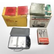A Kodak and a Hanimex projector, in original boxes, Hanimex slide magazine,