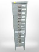 An enamelled metal 15-drawer index chest, 28cm wide x 43cm deep x 119cm high.