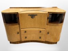 An Art Deco birdseye maple Beautility cocktail sideboard, width 138cm x depth 50cm x height 87cm.