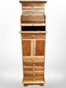 A contemporary hardwood tambour-fronted storage cabinet, width 49cm x height 170cm x depth 46cm.