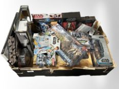 Approximately 17 Hasbro and other Star Wars figurines and related collectibles, boxed.