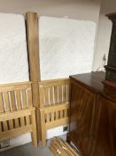 A contemporary oak three-foot bed frame with Cotswolds Beds mattress.