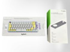 A Logiteck Pop Keys wireless keyboard and a Belkin 3 in 1 wireless charging pad with MAG safe