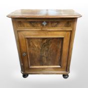 A 19th-century continental figured walnut and pine pier cabinet in the Biedermeier style,