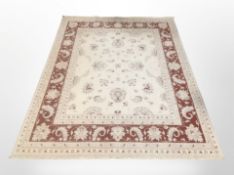 A contemporary machine-made Zeigler-style rug, 232cm x 168cm.