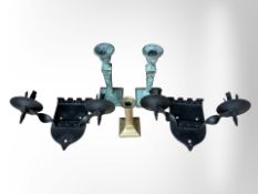 A pair of wrought-iron castellated twin-branch wall sconces, width 28cm,