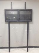 A painted metal double-door notice board, overall 213cm high x 118cm wide.