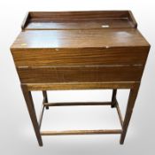 A mahogany clerk's writing desk, 69cm wide x 41cm deep x 97cm high.