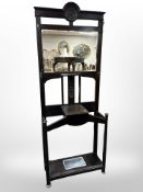 A late-Victorian stained oak mirror back hall stand, 77cm wide x 32cm deep x 201cm high.