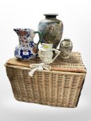 A wicker hamper, two Japanese export vases, an Imari vase, and a Sandland ware character jug.