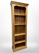 A contemporary pine open bookcase, 75cm wide x 29cm deep x 200cm high.