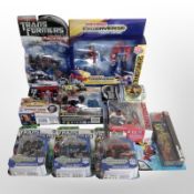 10 Hasbro Transformers figurines, boxed.