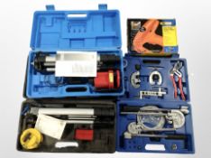 A Tacwise staple tacker/nailer, together with a cased pipe bender and two laser levels.