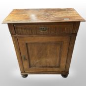 A 19th-century continental mahogany pier cabinet, width 67cm (as found).