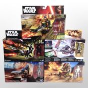 Five Hasbro Disney Star Wars figurines including Assault Walker, Imperial Speeder, etc., boxed.