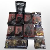 11 Hasbro and Disney Store Star Wars figurines including The Black Series, The Saga Collection, etc.