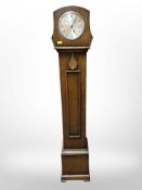 An oak Ferranti granddaughter clock, height 136cm.