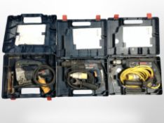 Three Bosch power drills, all boxed.