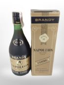 A bottle of Napoleon De Luxe VSOP Napoleon Brandy, 100cl, 36% vol., in carton.
