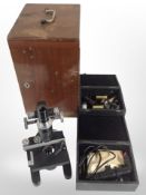 A Thomas Swift microscope numbered M201646, in mahogany travel case,