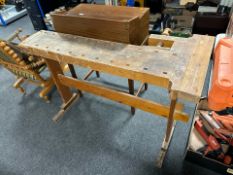 An early-20th century pine joiner's workbench, 150cm wide x 52cm deep x 81cm high.