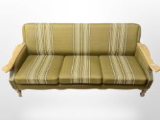 A Danish light oak three-seater settee, 186cm wide x 75cm deep x 77cm high.