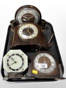 A Smiths bakelite-cased mantel clock, a further Smiths oak mantel clock, and two others.
