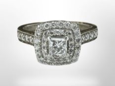 A platinum diamond cluster ring, size M. CONDITION REPORT: 5.