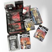 11 Hasbro and Disney Store Star Wars figurines including The Black Series, The Saga Collection, etc.