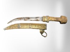 An Arabic dagger in sheath.