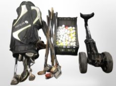 A Motocaddy golf bag containing assorted irons and drivers including Callaway, Ben Sayers, Wilson,